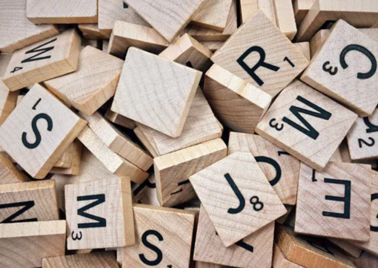 jumbled scrabble letter tiles